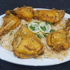 A picture of Chicken tikka pulao.