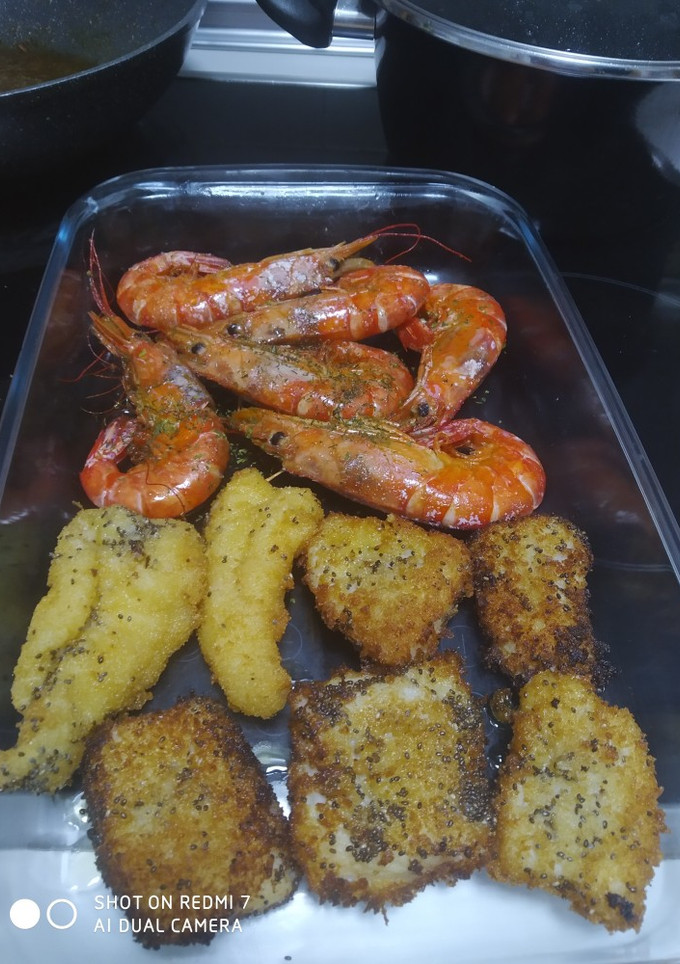 Una foto de Pescado con langostinos al jengibre 😋