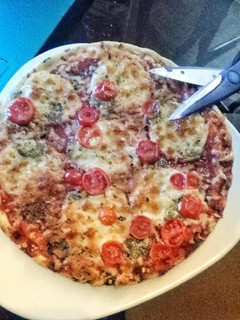 Una foto de Pizza casera. Trucos e ideas de toppings