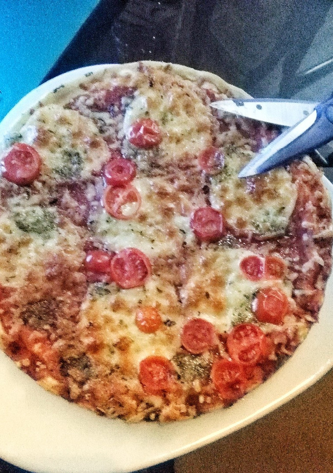 Una foto de Pizza casera. Trucos e ideas de toppings