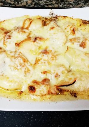 Una foto de Chipirones gratinados al queso San Simón