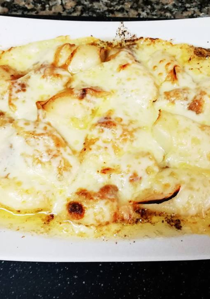 Una foto de Chipirones gratinados al queso San Simón