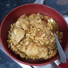 Seasoned chicken and beans A picture of Seasoned chicken and beans.