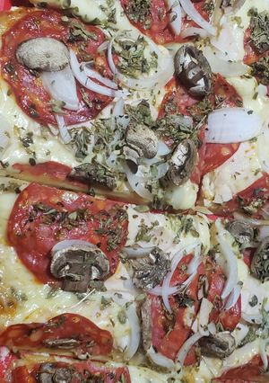 Una foto de Pizza
