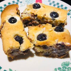 A picture of Chocolate 🍫 Chip / Blueberry Cookie 🍪 Dough Cheesecake.