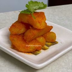 A picture of Schezwan Chutney in Schezwan Potato.