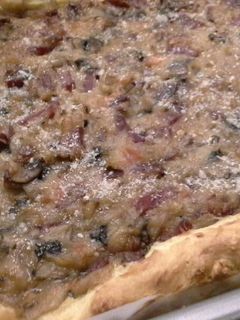 Una foto de Gougère de champiñones y jamón
