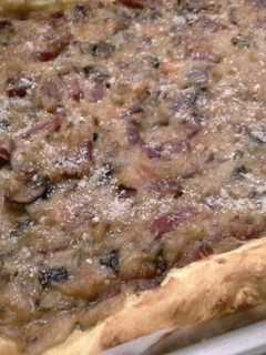 Una foto de Gougère de champiñones y jamón