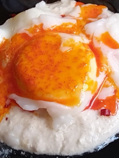 A picture of Poached Egg with Garlic Yogurt and Butter Chilli Sauce - Cilbir - Turkish Egg Breakfast.
