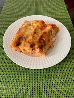 Una foto de Canelones de pollo con champiñones