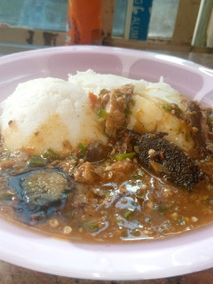 A picture of Swallow and okro soup.