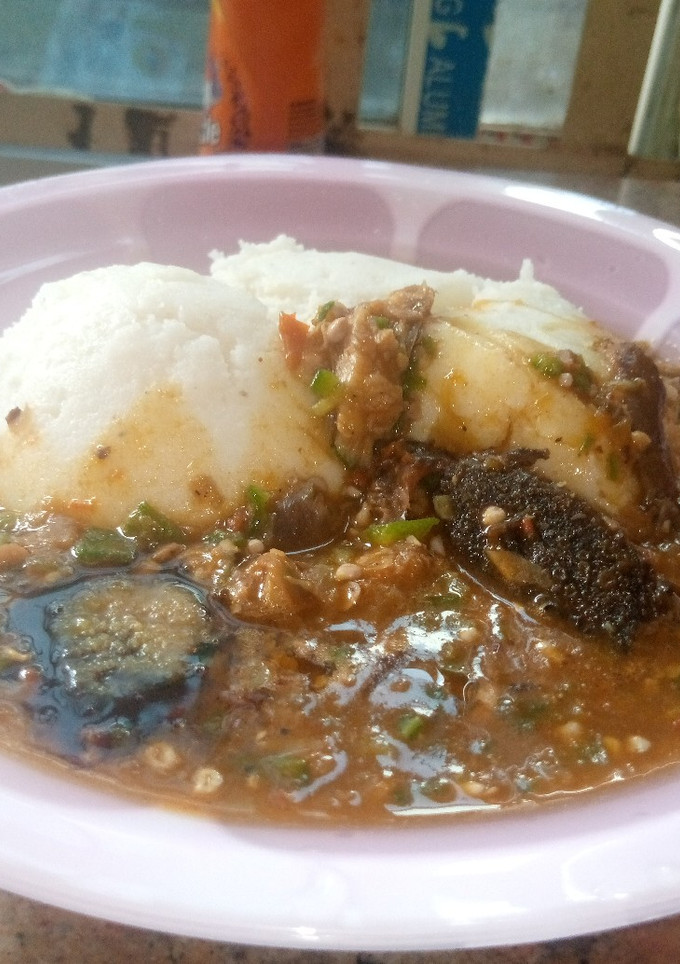 A picture of Swallow and okro soup.