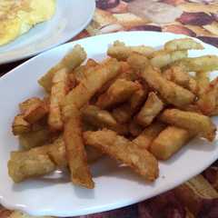 Una foto de Berenjenas disfrazadas de patatas fritas