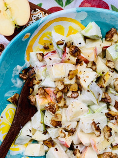 A picture of Creamy Apple and Pears Salad with roasted Walnuts.