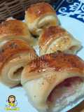 Enrolado de queijo e presunto