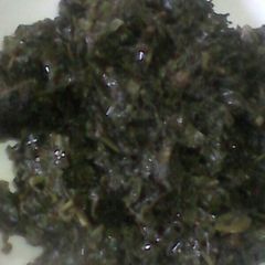 A picture of Fried mnavu and mchicha leaves(black nightshade+amaranth).