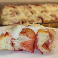 A picture of Strawberry Rolls with Lemon Cream Cheese Glaze.