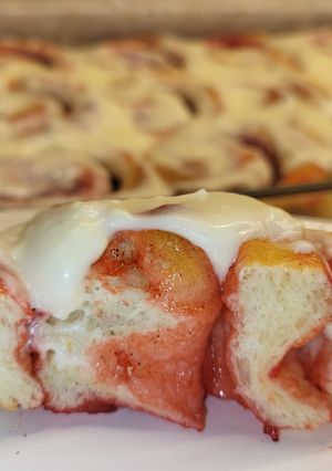 A picture of Strawberry Rolls with Lemon Cream Cheese Glaze.