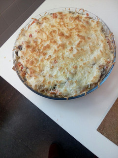 Una foto de Menestra gratinada con queso mozzarella