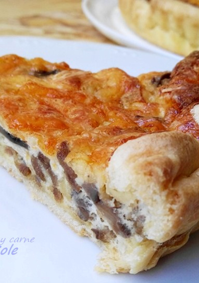 Una foto de Quiche de champiñones y carne