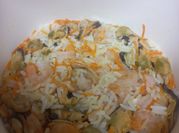 Una foto de arroz con choritos y camarones