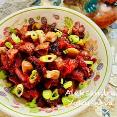 A picture of Warm beet salad with dried plums and chestnuts.