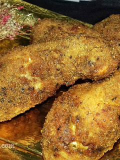 Una foto de Muslos de pollo frito