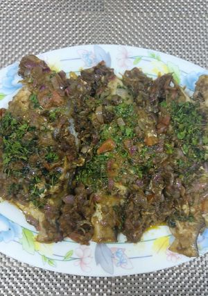 A picture of Stuffed green masala pomfret.