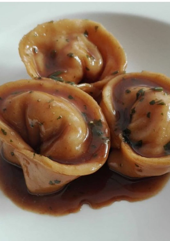 Una foto de Pasta fresca rellena de gambas
