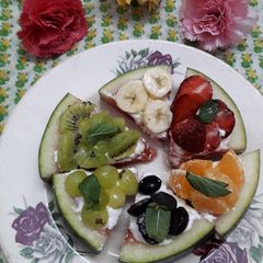 A picture of Watermelon fruit pizza.