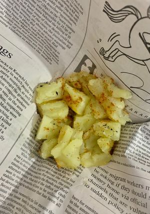 A picture of Street style shakerkandi (roasted sweet potato on Tawa).