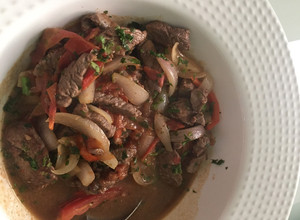 Una foto de Lomo Saltado