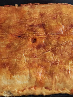 Una foto de Empanada clásica de atún con masa casera muy genuina