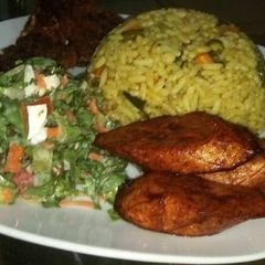 A picture of Jallof rice salad & plantain.