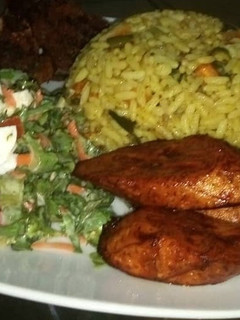 A picture of Jallof rice salad & plantain.
