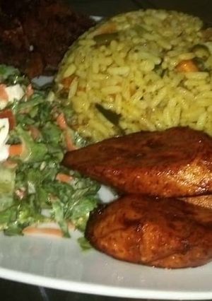 A picture of Jallof rice salad & plantain.