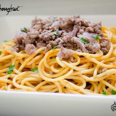 A picture of Spaghetti_Bolognese#Spaghetti_with_meat_and_tomatoe_sauce.