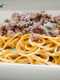 A picture of Spaghetti_Bolognese#Spaghetti_with_meat_and_tomatoe_sauce.