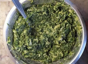 Una foto de Fainá relleno de espinaca y cebollas asadas
