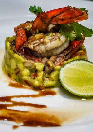 A picture of Prawns temptations with classic guacamole.