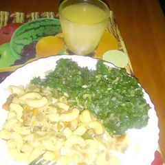 A picture of Macaroni n minced beef with creamed spinach.