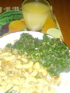 A picture of Macaroni n minced beef with creamed spinach.