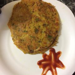 A picture of Crispy veggies besan (gram flour)layered Parantha.