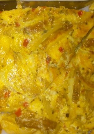 Una foto de Tortilla de papa con cebolla y morrón