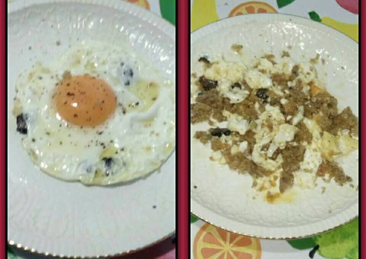 Huevos fritos trufados con miga de pan de payés