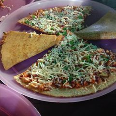 A picture of Cheese and paneer dosa.