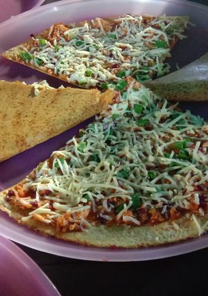 A picture of Cheese and paneer dosa.