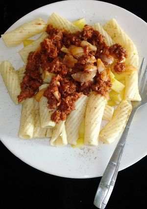 A picture of Macaroni, potota and minced meat.