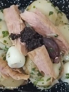 Una foto de Papas aliñás