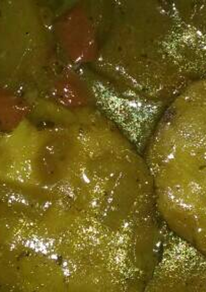 Una foto de Medallones de merluza con patatas y salsa